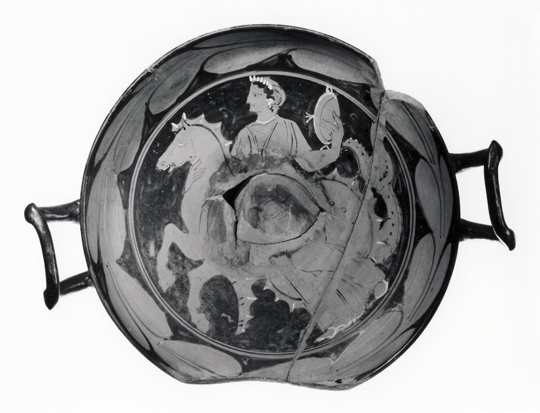 Kylix with a laurel branch (A, B) and a nereid on a sea-horse (tondo), H644