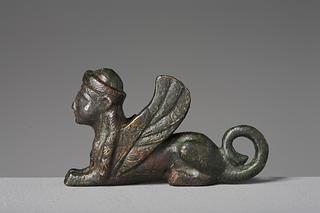 H2022 Statuette of a couchant sphinx