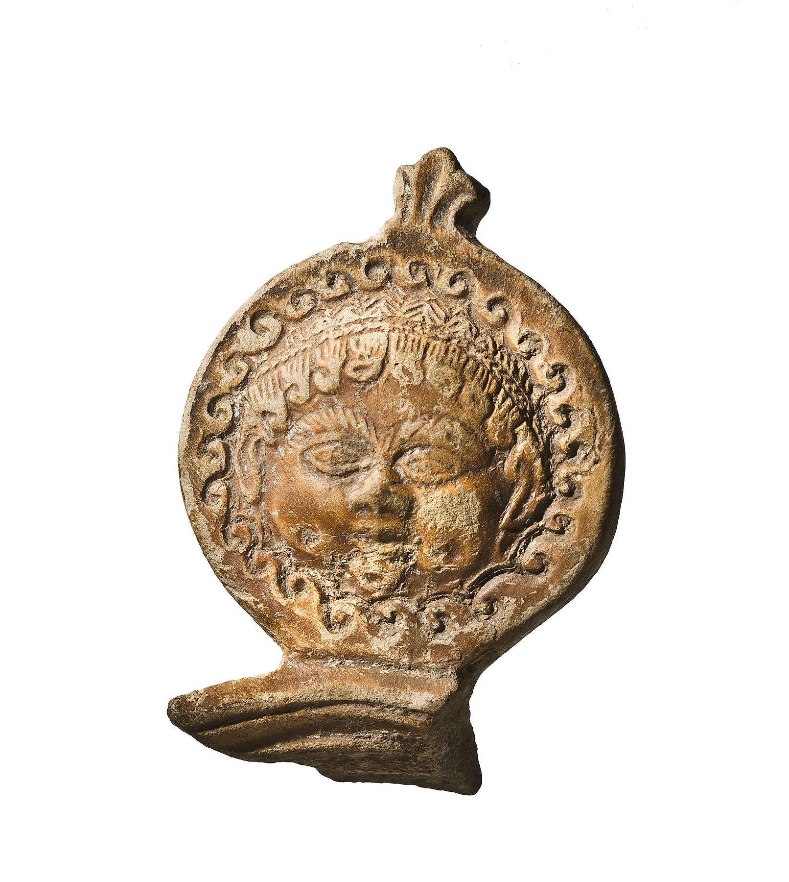 Lamp handle with a gorgo mask and palmette leaf, H1238