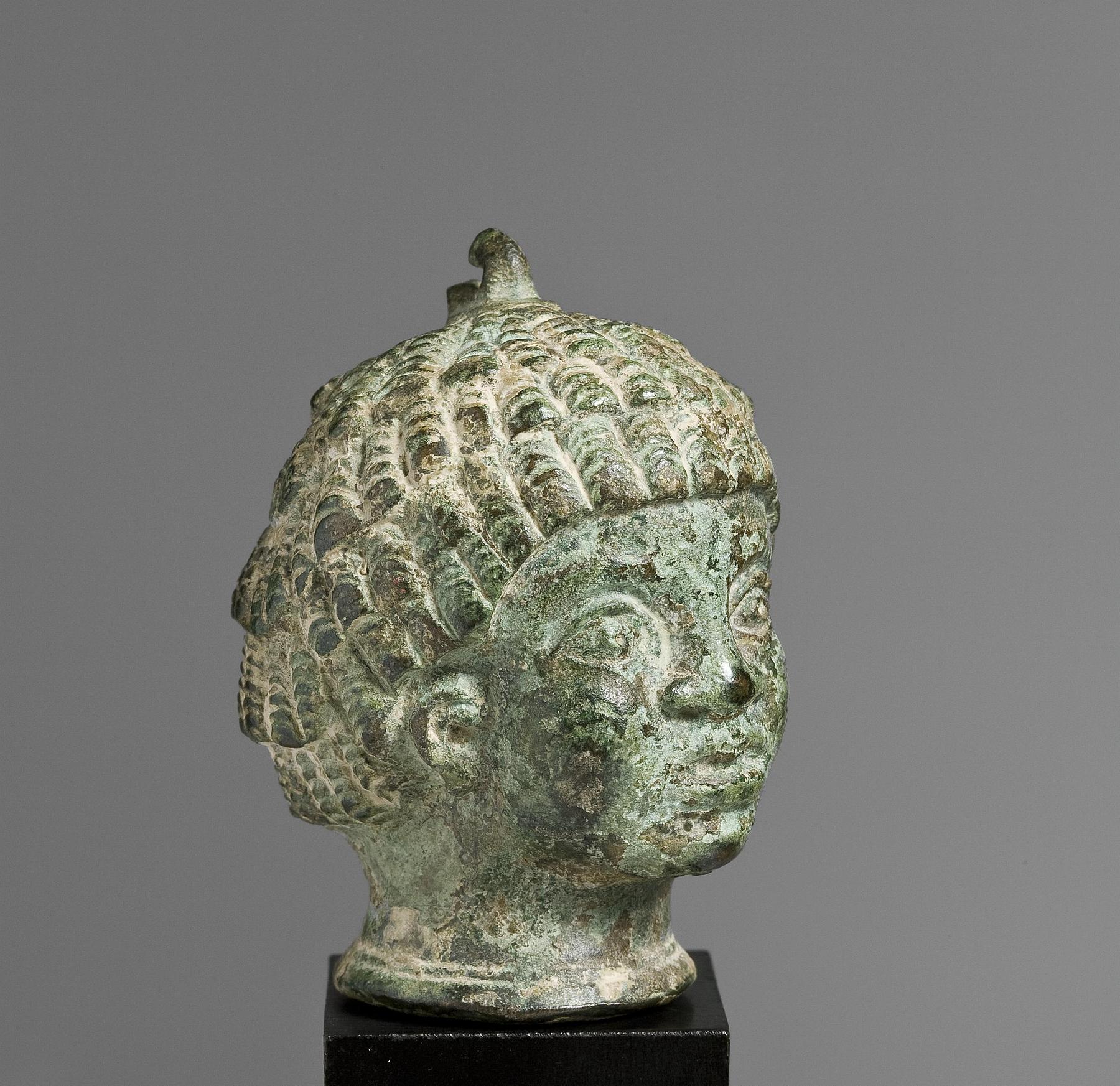 Weight in the shape of the head of an African boy, H2346