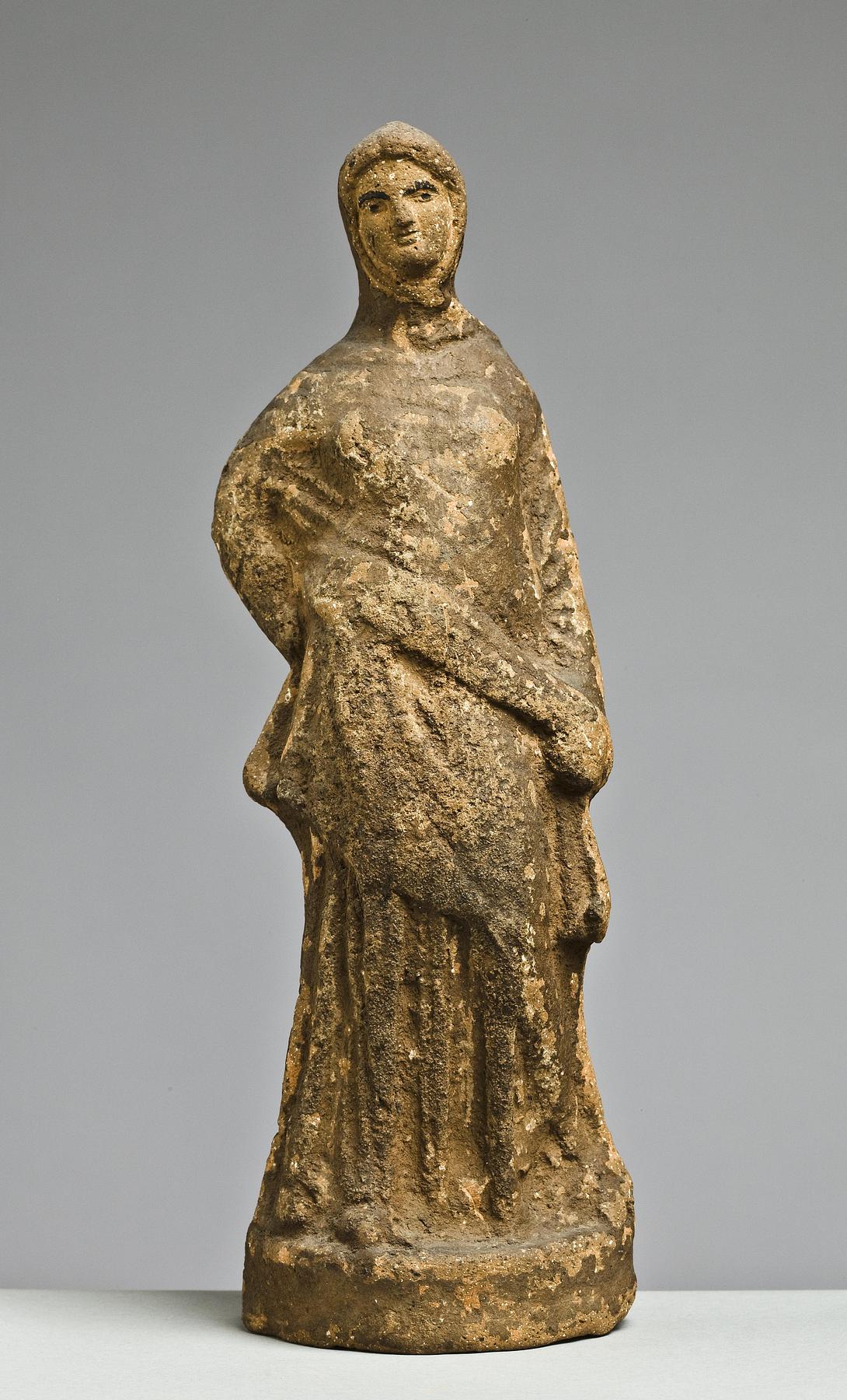 Statuette of a woman, H1019