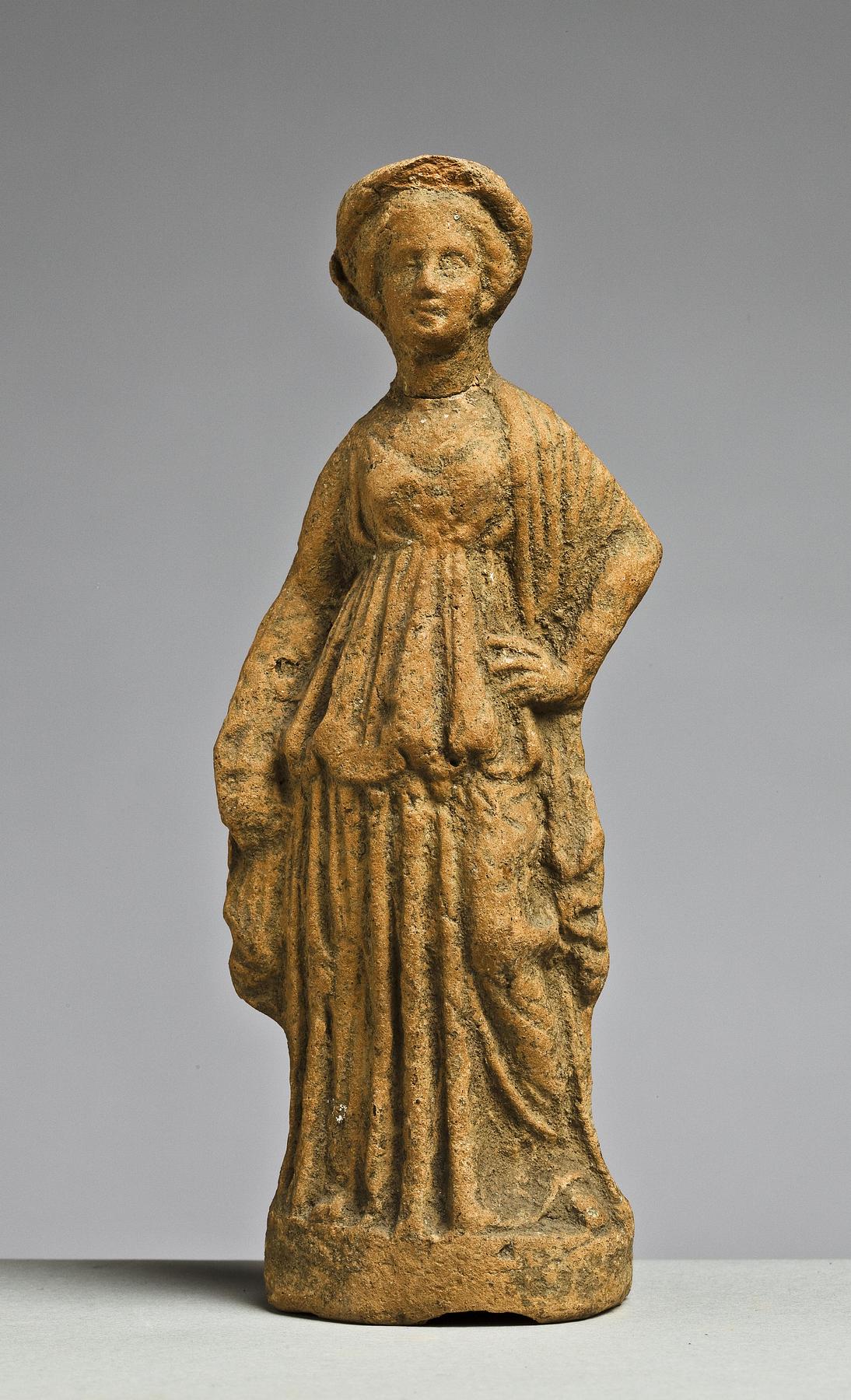 Statuette of a woman, H1023
