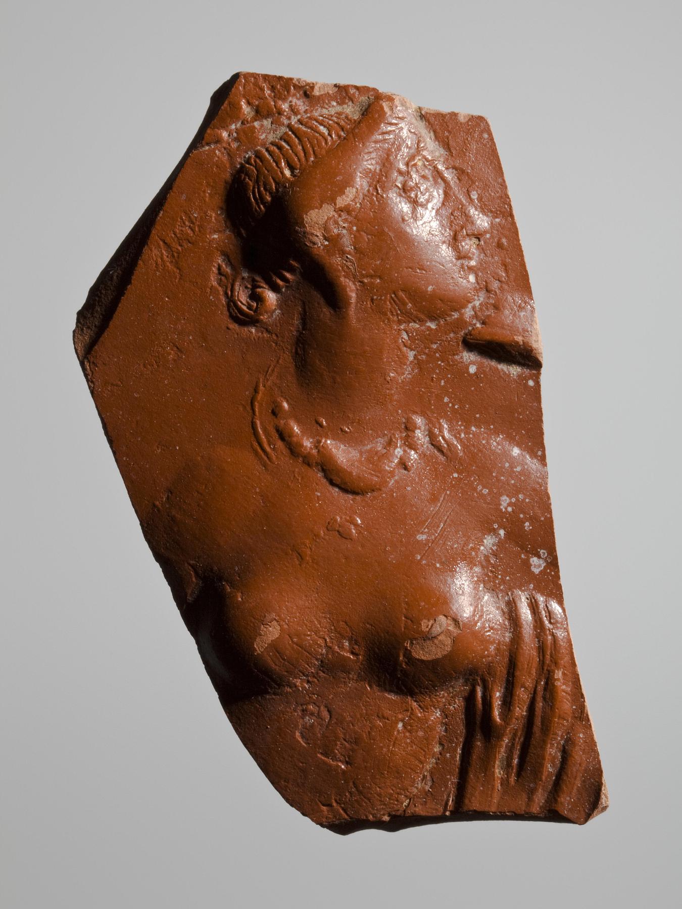 Vessel with relief decoration of a nude woman, H805
