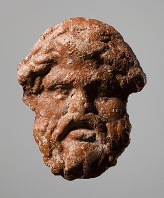 H802 Vessel with relief decoration of a silenus mask