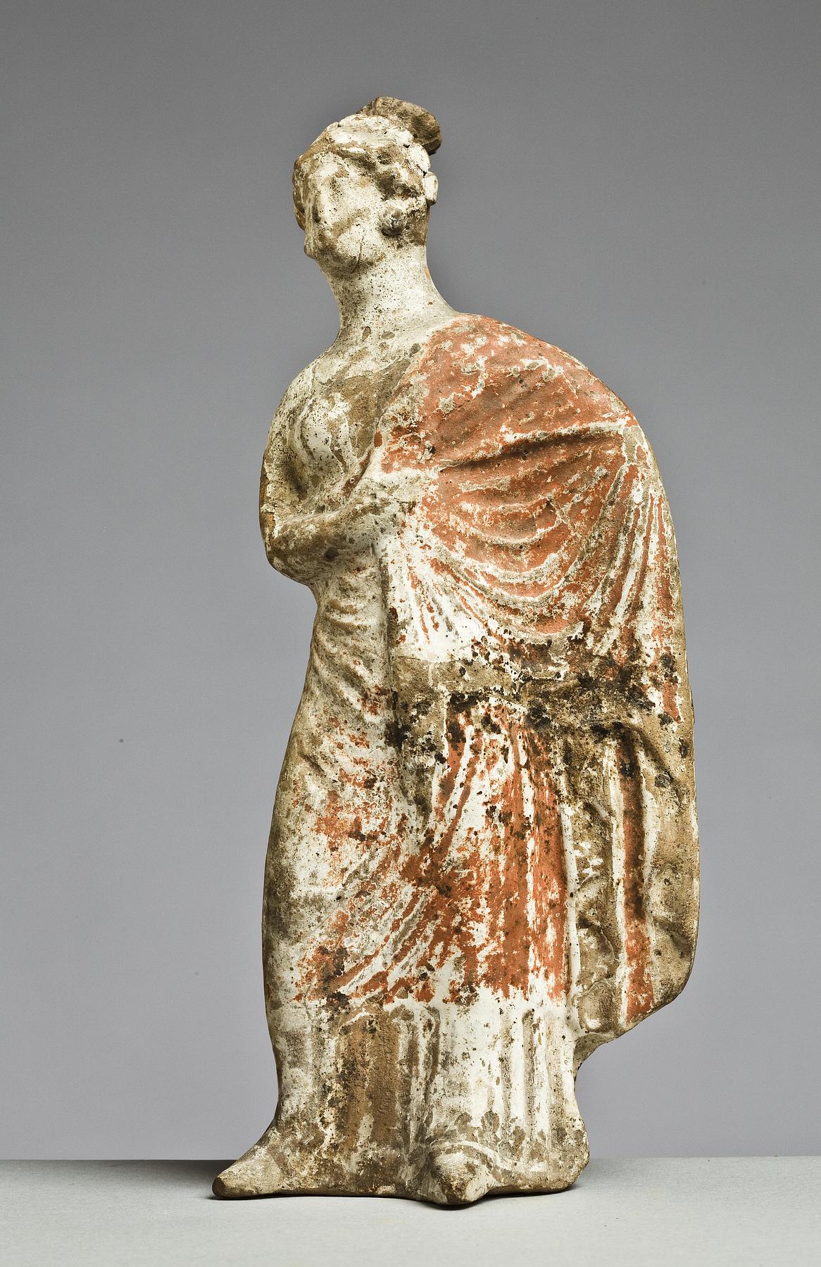Statuette of a woman, H1024