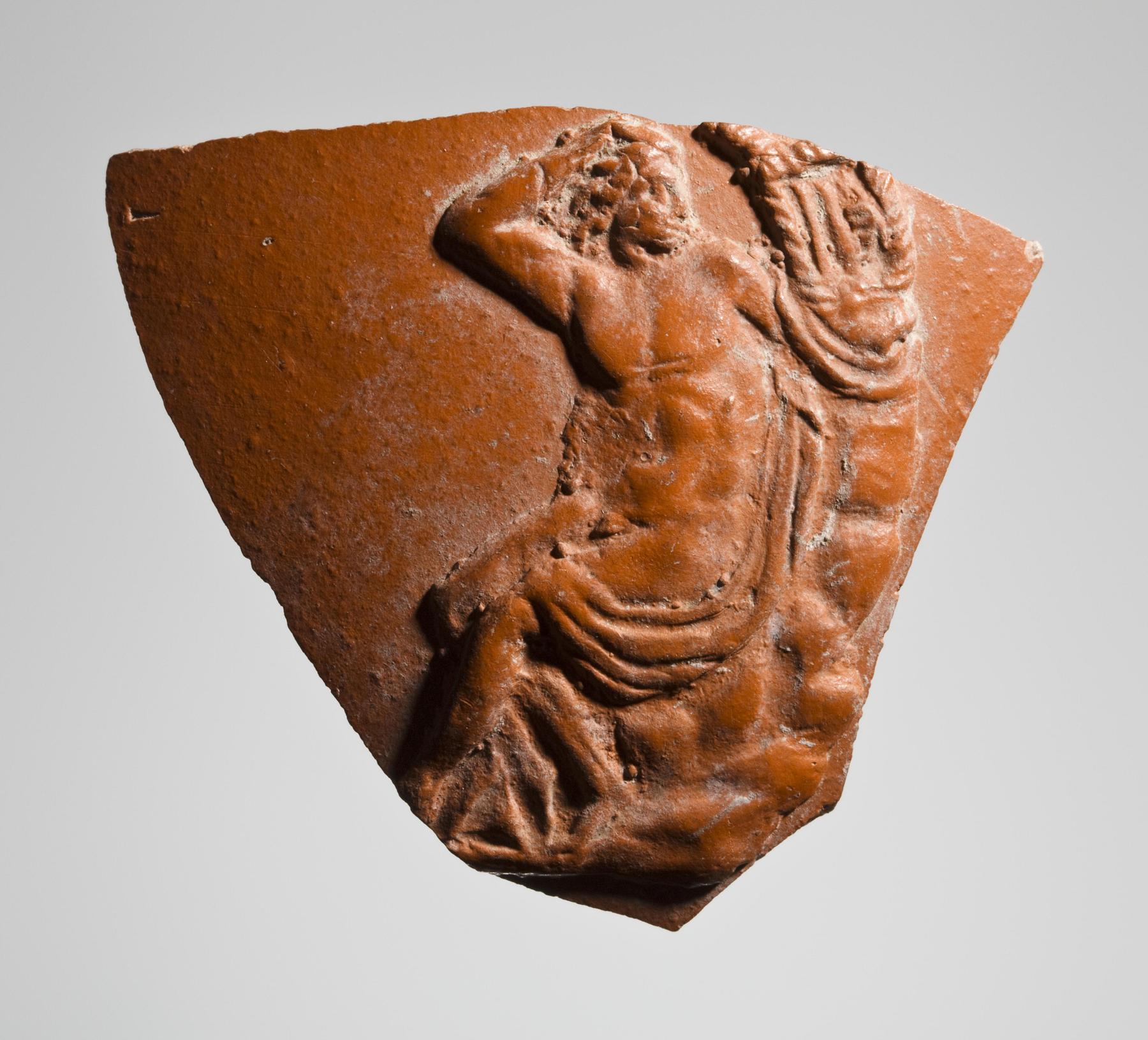 Vessel with relief decoration of Apollo (?) seated with a lyre, H809