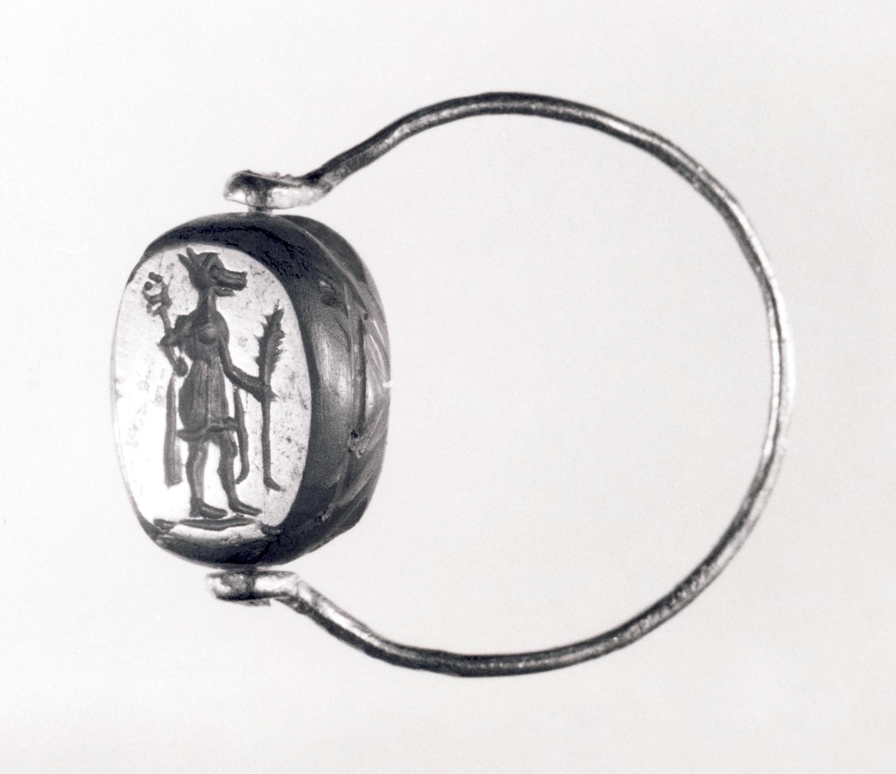 Isis-emblem (forside), Anubis med palmegren og heroldstav (bagside), I56