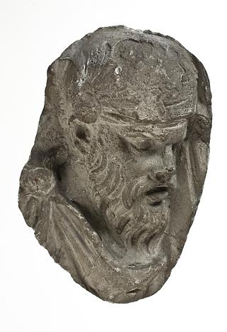 L331b Heads of Dacian warriors wearing caps
