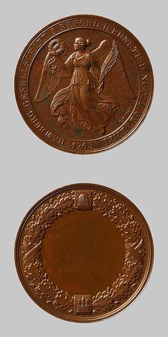 F130 Medaljens forside: Victoria svævende med palmegren og krans. Medaljens bagside: Egekrans, skjold med en bikube og Hamborgs byvåben