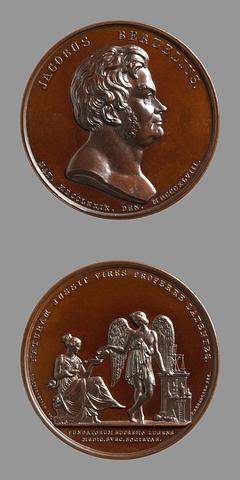 F145 Medaljens forside: Kemikeren Jöns Jakob Berzelius. Medaljens bagside: Kemiens genius hælder lægemiddel i Hygieias skål