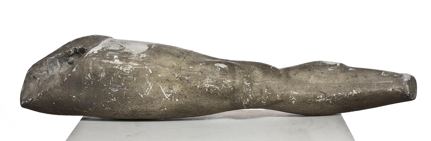 A bended right leg with part of the buttock, L23