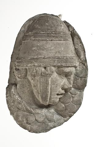 L333c Heads of Sarmatian horsemen wearing conical helmets