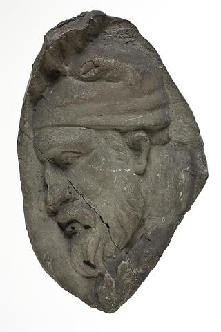 L331k Heads of Dacian warriors wearing caps