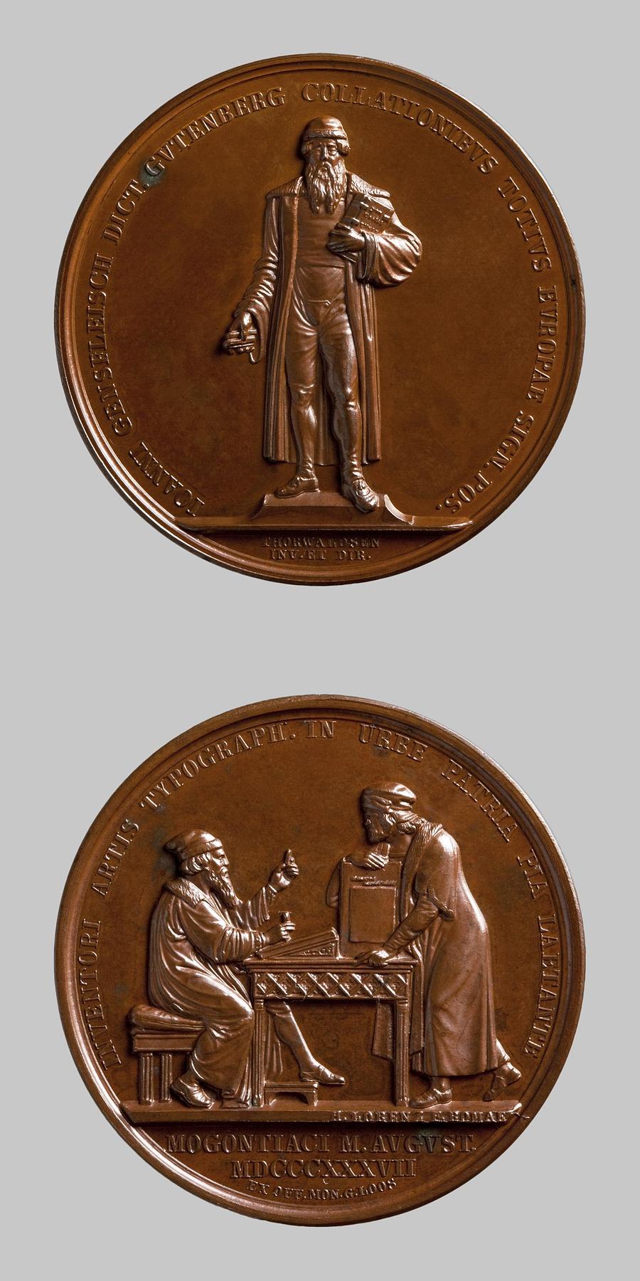 Medaljens forside: Johann Gutenberg. Medaljens bagside: Opfindelsen af de bevægelige typer, F21b