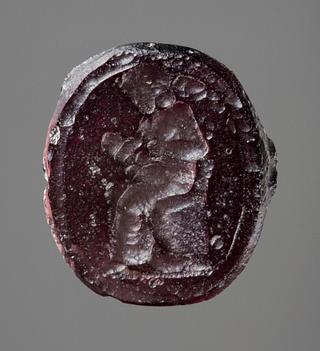 I162 Seated woman with a child