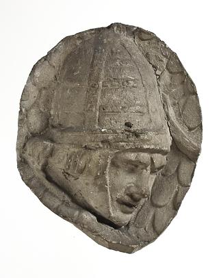 L333e Heads of Sarmatian horsemen wearing conical helmets