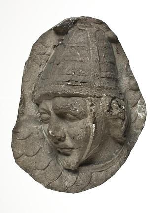 L333i Heads of Sarmatian horsemen wearing conical helmets
