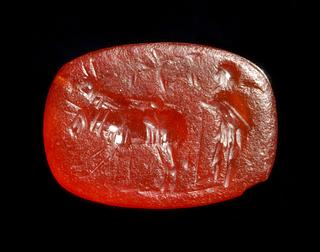 I1161 Man plowing with two oxen